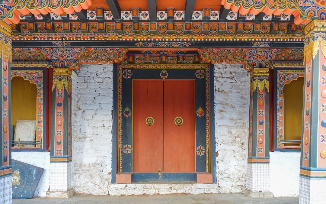 land of the dragon king, bhutan, paro, dzong, wooden, doors, architecture, travel, blog, humble and free